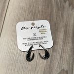 Free People silver tone twisted hoop earrings Photo 1