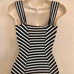 Marciano Like new stretchy  top. No size tag but fits XS-S Photo 1