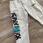 American Eagle White jogger sweatpants with mtv logo on leg Photo 1