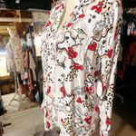  off white shirt long sleeve pockets red hearts evil eyes stars NWT Button up  Available size: S ;; L New with tag  Same day shipping  Smoke and pets free  This Milk & Honey shirt is a must-have for any fashion-forward woman. Featuring a unique design with red hearts, evil eyes, and stars, this shirt is sure to turn heads. It also has long sleeves, a button closure, and pockets, making it both stylish and functional.   The shirt comes in a multicolor pattern and is available in size S and L. Made for all seasons, it is perfect for any occasion. The brand, Milk & Honey, is known for its quality and attention to detail. This shirt is brand new with tags and is sure to be a great addition to your wardrobe.  Photo 1