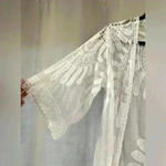 Rebellion Women’s White  Throw over Photo 1