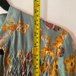 Free People  So Fine Smocked Blue Floral Butterfly Flowy Blouse Women size Medium Photo 9