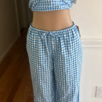 Colsle Stylish blue gingham two-piece set featuring a crop top and wide-leg pants. Photo 0