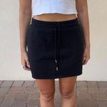Black mini skirt terry cloth Size M Photo 2