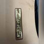 Louise et Cie  Gold Emblem Photo 3