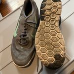 Nike Gray and Green Athletic Shoes Photo 1