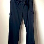 Kendall + Kylie Kendell and Kylie black paper bag pants. Cargo pockets in size large. Photo 0