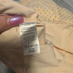 Adidas  Women's Sleeveless Polo Shirt - White and Orange Photo 2