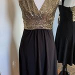 Star Vixen Small Black & Gold Dress Photo 0