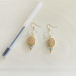 Elegant Gold Earrings with Bow Accent Photo 3