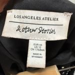 & Other Stories & Other Stories Los Angeles Satin polka dot print flippy mini skirt in black 12 Photo 4