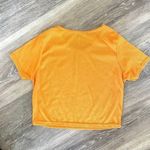 Boohoo cropped orange short sleeved top Photo 6