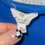 Live in the Moment  Scooped Neck Silky Cropped Top Women’s medium Short Sleeve Photo 1