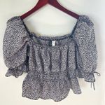 Divided Baby doll floral blouse. Size small Photo 1