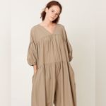 Black crane oversized puff jumpsuit in light clay color Photo 6