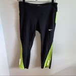 Nike  Dri Fit cropped leggings - black/green Photo 1