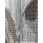 Free People  White Ribbed Knit Short Sleeve Bodysuit Snap Closure Cutout Sides Photo 2