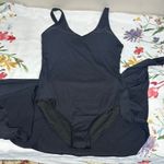 Tempt Me Black Sleeveless V-Neck One Piece Swim with Built in Coverup Skirt Photo 2