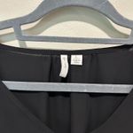 Black short sleeve top with floral sleeves Size L Photo 3