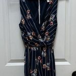 Everly Short Romper Sz XS Faux Wrap Sleeveless V Neck Navy Floral Summer Travel Photo 0