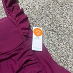 Stylish burgundy swimsuit with ruffled straps. Perfect for a chic beach look. Purple Size XL Photo 4