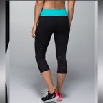 Lululemon  Water Bound Crops Black and Blue Tropics Size 4 Photo 1