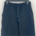 One Piece  jump in the brand black wide leg joggers size Small Photo 1