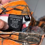 Rockstar Vibrant Orange and Black Jeans with Distressed Details Size XS Photo 12