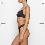 SKIMS  onyx fits everybody Demi unlined lace bra 34B NWT Photo 1