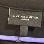 LIVE UNLIMITED LONDON BRAND BLACK TUNIC TOP V NECK L/S ON 6” SHEER RUFFLE HEM Size undefined Photo 3