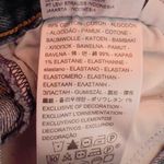 Levi's Medium Wash Structured Denim Wedgie Fit Jeans with Smiley Face Patch Photo 6