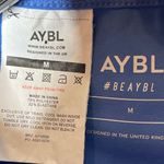AYBL  Medium Staple Crop Short Sleeve Shirt in Cobalt Blue Athleisure Workout Gym Photo 4