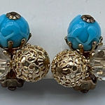 Vintage Vogue ornate clip on earrings. Ab and blue glass . Gold Photo 0
