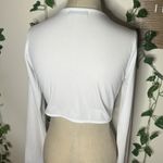 Just Quella  White O-Ring Longsleeve Crop Top Photo 3
