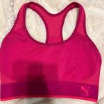 Puma  bright pink sports bra in large Photo 0