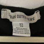 Urban Outfitters : Lot of 2- Black Asymmetrical long sleeve- Polka dot v-neck- XS Photo 1