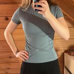 Amazon Women small blue and black fitted/slim workout shirt Photo 3