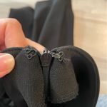 Tobi  Black Bodycon Style Mini Skirt With Crisscross Cut Out Detail- Size Small Photo 4