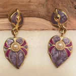 Unique earrings with‎ small pearl detail. Photo 0