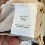 Adam Levine  silver velvet long sleeved romper Photo 3