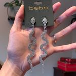 Bebe  Long Serpentine diamond paved crystal snake drop earrings Photo 1