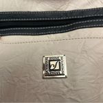 Stone Mountain Versatile White and Black Crossbody Bag with Adjustable Strap Photo 4