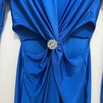 Beautiful dress ,stretchy fabric.Like new used one time only ,has couple imperfections not noticeable see last2 pictures Blue Size L Photo 4
