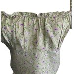 Motel -LIGHT GREEN FLORAL CROP TOP-SIZE MEDIUM Adorable green crop top with little purple flowers, side zipper, puff sleeves, size medium, excellent condition  Measurements: Bust: armpit to armpit 17 inches  Length: shoulder seam to bottom 16 inches Photo 0