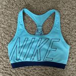 Nike  Women’s Medium Impact Sports Bra Photo 0