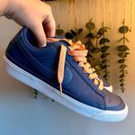 Nike Navy Round Top Flat with Orange details Sneakers Photo 1