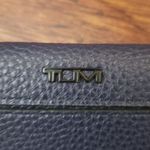 NWOT Tumi Navy Chic Feminine Quiet Luxury Dainty Leather Wristlet Wallet 6.5x4in Blue Photo 1