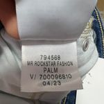 Old Navy Mid- Rise Rockstar Skinny Jeans Photo 9