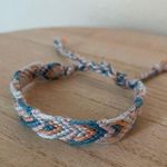 Handmade 10/$25 Cyan Woven Bracelet Photo 0