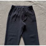 Lululemon Women's On the Fly Woven Pants Ankle Black Size 4 Photo 1